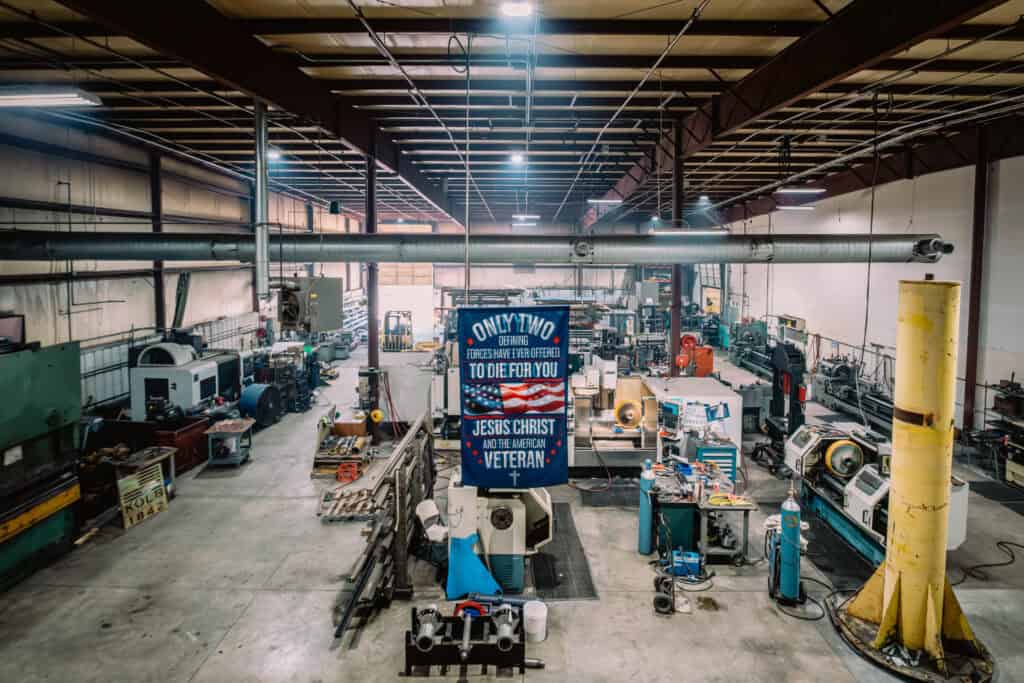 Wesco Machine Works manufacturing facility with heavy machinery and equipment.