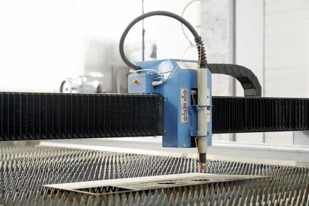 Industrial laser cutting machine at Wesco Machine Works.